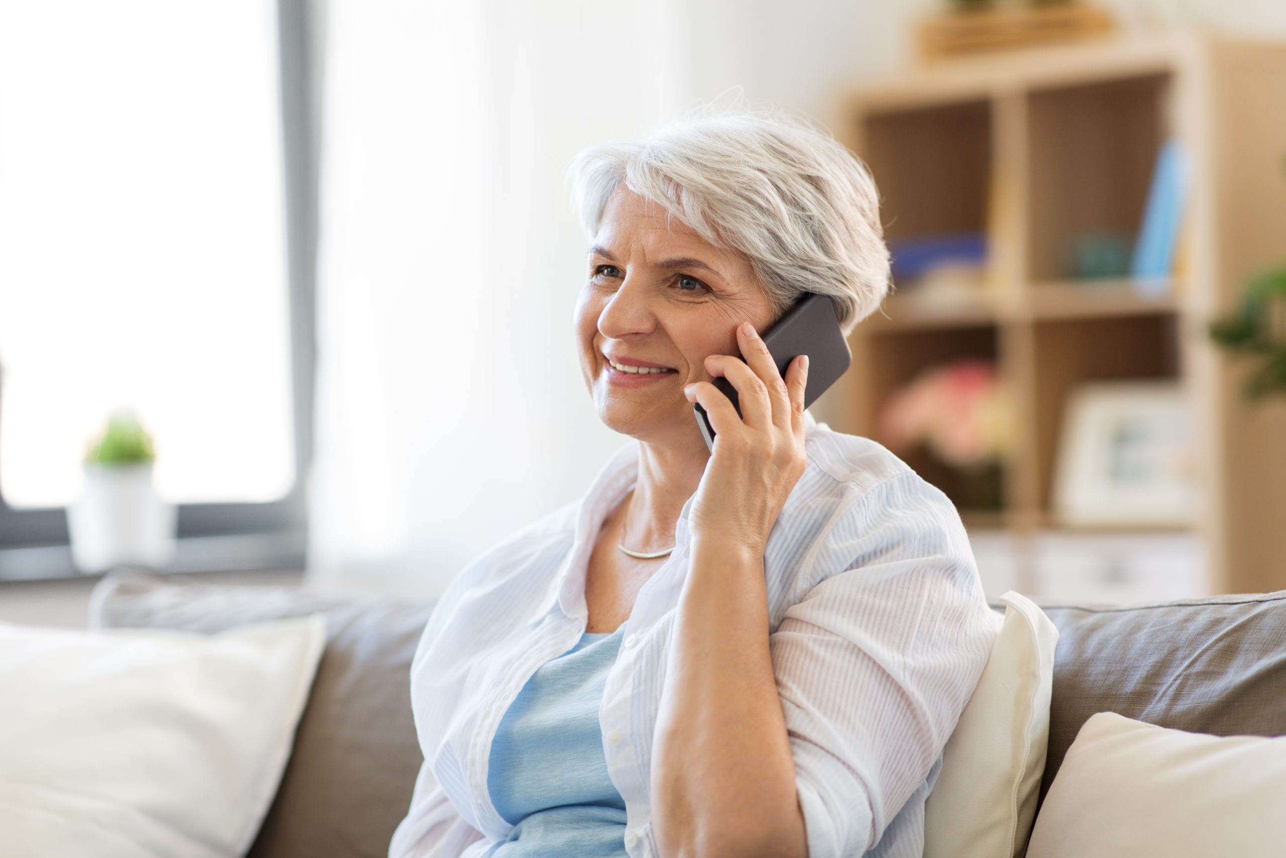 older women talking on a cell phone about Medicare